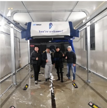 Commissioning team inside a JetWash wash tunnel